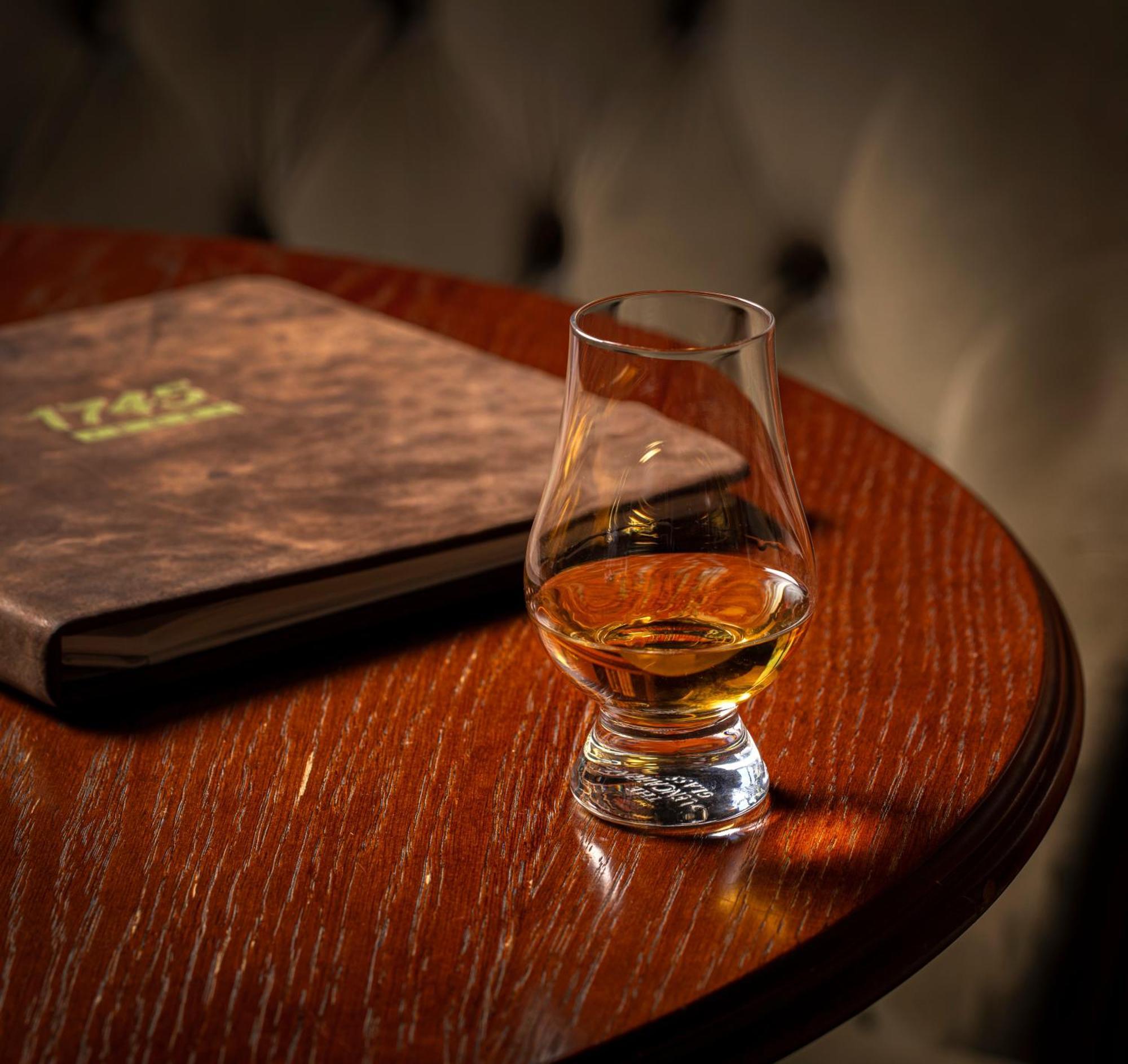Schloss Roxburghe, Part Of Destination By Hyatt Bagian luar foto A dram of single malt Scotch whisky